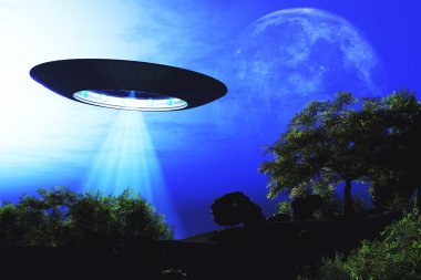 yeryüzünde geceleri alan üzerinde uçan ufo