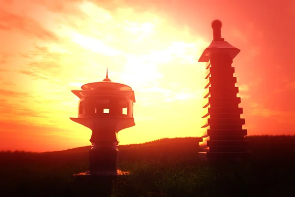 Japonské kamenné lucerny v západu slunce — Stock fotografie