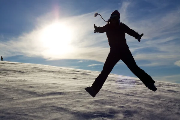 Saltar na neve — Fotografia de Stock