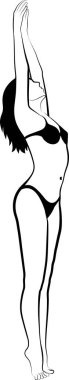 standing woman in two-piece swimsuit