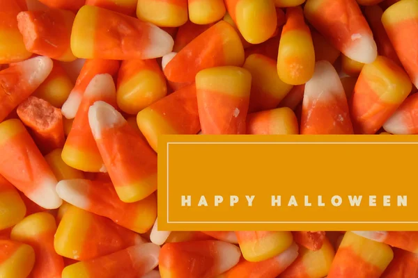 halloween candy corn background. colorful candies for fall season holiday