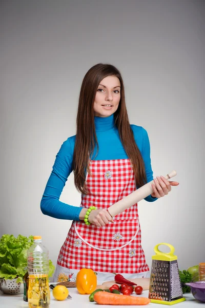 Portrait of a pretty cooking woman — Stock Photo, Image