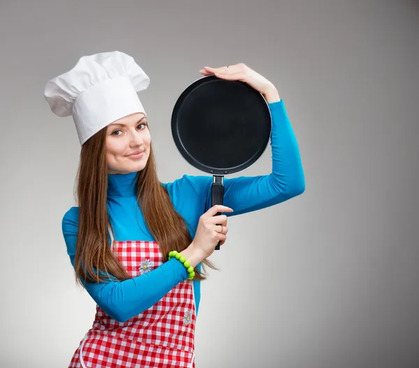 Porträtt av en leende kvinna med pan — Stockfoto