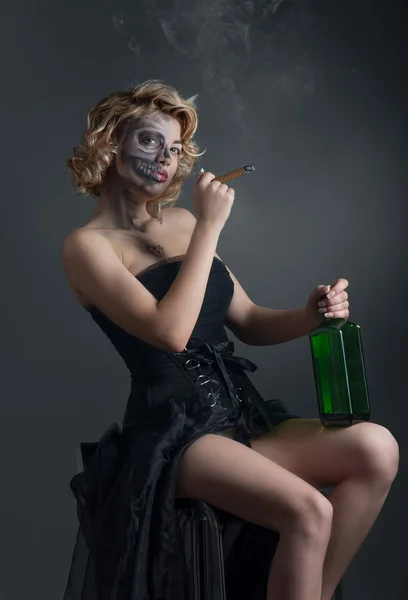 Drinking and smoking woman with skull make-up — Stock Photo, Image