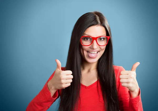 Playful girl with a thumb up — Stock Photo, Image