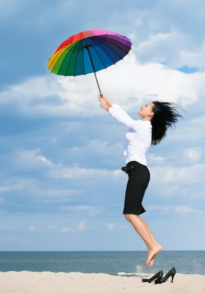 Woman flying away from her problems — Stock Photo, Image