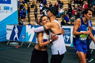 Atina, Yunanistan - 38. Otantik Atina Maratonu 'nun bitiminde 14 Kasım 2021 Koşu, geçen yıl Yunanistan' ı vuran koronavirüs salgını sonrasında yarışma iptal edildi