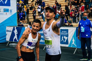 Atina, Yunanistan - 38. Otantik Atina Maratonu 'nun bitiminde 14 Kasım 2021 Koşu, geçen yıl Yunanistan' ı vuran koronavirüs salgını sonrasında yarışma iptal edildi