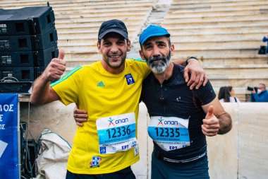 Atina, Yunanistan - 38. Otantik Atina Maratonu 'nun bitiminde 14 Kasım 2021 Koşu, geçen yıl Yunanistan' ı vuran koronavirüs salgını sonrasında yarışma iptal edildi