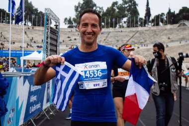 Atina, Yunanistan - 38. Otantik Atina Maratonu 'nun bitiminde 14 Kasım 2021 Koşu, geçen yıl Yunanistan' ı vuran koronavirüs salgını sonrasında yarışma iptal edildi