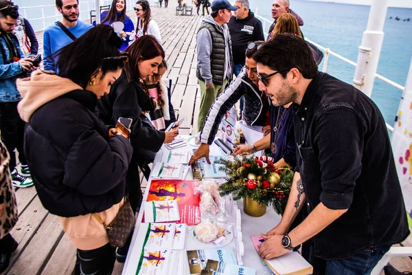 Limasol, Kıbrıs - 18 Aralık 2021 Gençlik Kanser Günü, Limasol 'da çocuklara ve kanserden etkilenen ailelerine yardım etmek amacıyla düzenlenen yardım ve spor etkinliği.