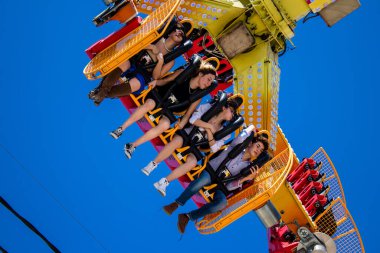 Seville, Spain - May 05, 2022 Feria de Sevilla funfair, the attractions and rides are open again, This party is back after two years of absence due to an epidemic of covid