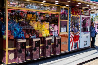 Seville, Spain - May 05, 2022 Feria de Sevilla funfair, the attractions and rides are open again, This party is back after two years of absence due to an epidemic of covid