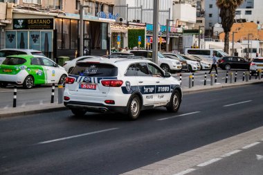 Tel Aviv, Israel - May 07, 2022 Police car rolling in the streets of Tel Aviv during the coronavirus outbreak hitting Israel