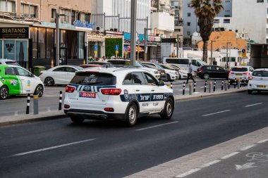 Tel Aviv, Israel - May 07, 2022 Police car rolling in the streets of Tel Aviv during the coronavirus outbreak hitting Israel