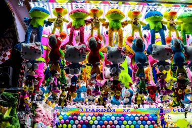 Carmona, Spain - May 11, 2022 Feria de Carmona funfair, attractions and rides are open again, party is back after two years of absence due to an epidemic of covid