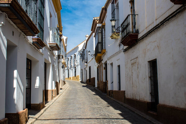 Carmona, Spain - June 08, 2022 Cityscape and architecture of the city of Carmona called The Bright Star of Europe, the famous white town shows a typical narrow and meandering Arabic layout