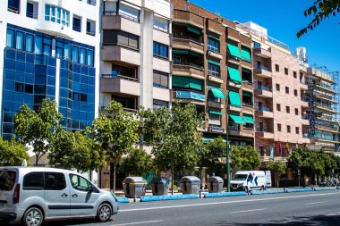 Seville, Spain - July 04, 2022 Facade of a building in the streets of Seville, an emblematic city and the capital of the region of Andalusia, in the south of Spain