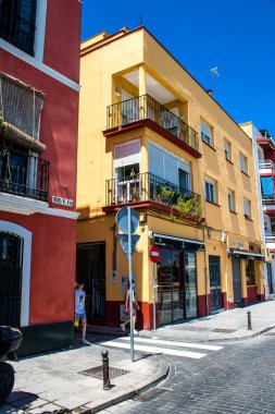 Seville, Spain - July 04, 2022 Facade of a building in the streets of Seville, an emblematic city and the capital of the region of Andalusia, in the south of Spain