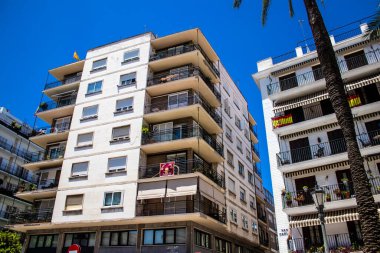 Seville, Spain - July 04, 2022 Facade of a building in the streets of Seville, an emblematic city and the capital of the region of Andalusia, in the south of Spain