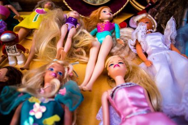 Seville, Spain - July 14, 2022 Various objects sold at the Flea market, also known as Mercadillo Historico Del Jueves, locals are busy poking around looking for bargains in the narrow Calle Feria