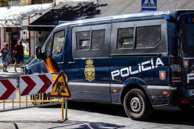 Seville, Spain - September 01, 2022 Police car patrolling in the streets of Seville, an emblematic city and the capital of the region of Andalusia, in the south of Spain