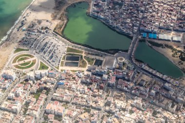 Seville, Spain - August 19, 2022 Commercial flight between the city of Seville in Spain and Tetouan in Morocco, View from the sky of the land and the Strait of Gibraltar separating Europe and Africa