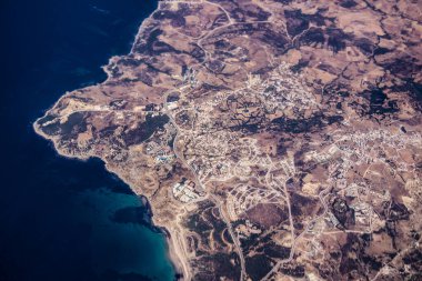 Seville, Spain - August 19, 2022 Commercial flight between the city of Seville in Spain and Tetouan in Morocco, View from the sky of the land and the Strait of Gibraltar separating Europe and Africa