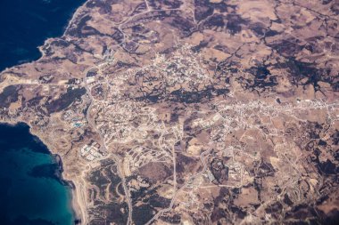 Seville, Spain - August 19, 2022 Commercial flight between the city of Seville in Spain and Tetouan in Morocco, View from the sky of the land and the Strait of Gibraltar separating Europe and Africa