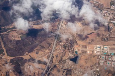 Seville, Spain - August 19, 2022 Commercial flight between the city of Seville in Spain and Tetouan in Morocco, View from the sky of the land and the Strait of Gibraltar separating Europe and Africa