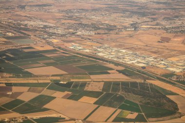 Seville, Spain - August 19, 2022 Commercial flight between the city of Seville in Spain and Tetouan in Morocco, View from the sky of the land and the Strait of Gibraltar separating Europe and Africa