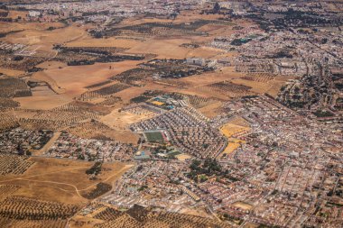 Seville, Spain - August 19, 2022 Commercial flight between the city of Seville in Spain and Tetouan in Morocco, View from the sky of the land and the Strait of Gibraltar separating Europe and Africa