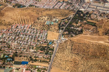 Seville, Spain - August 19, 2022 Commercial flight between the city of Seville in Spain and Tetouan in Morocco, View from the sky of the land and the Strait of Gibraltar separating Europe and Africa