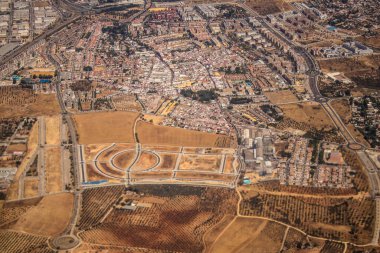 Seville, Spain - August 19, 2022 Commercial flight between the city of Seville in Spain and Tetouan in Morocco, View from the sky of the land and the Strait of Gibraltar separating Europe and Africa