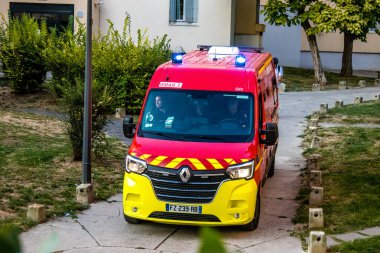 Reims, France - September 03, 2022 Fire engine driving through the streets of Reims during the coronavirus outbreak hitting France