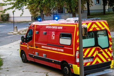 Reims, France - September 03, 2022 Fire engine driving through the streets of Reims during the coronavirus outbreak hitting France