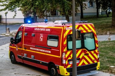 Reims, France - September 03, 2022 Fire engine driving through the streets of Reims during the coronavirus outbreak hitting France
