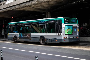 Paris, France - September 05, 2022 Bus driving through the streets of Paris, Buses are inexpensive and drop you off at any location in the capital quite quickly, many of its buses run on gas
