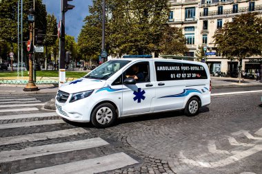Paris, France - September 05, 2022 Ambulance driving through the streets of Paris during the coronavirus outbreak hitting France