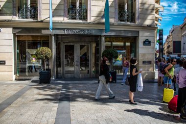 Paris, France - September 05, 2022 Cityscape of the famous Avenue Des Champs Elysees in Paris during the coronavirus epidemic which is hitting France