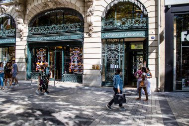Paris, France - September 05, 2022 Cityscape of the famous Avenue Des Champs Elysees in Paris during the coronavirus epidemic which is hitting France