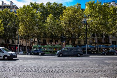 Paris, France - September 05, 2022 Cityscape of the famous Avenue Des Champs Elysees in Paris during the coronavirus epidemic which is hitting France