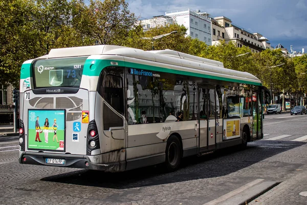 Paris, France - September 05, 2022 Bus driving through the streets of Paris, Buses are inexpensive and drop you off at any location in the capital quite quickly, many of its buses run on gas