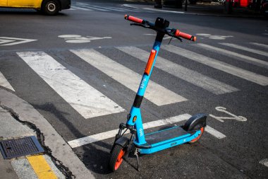 Paris, France - September 05, 2022 Accessible electric scooter to hire for short periods of time, usually for a few hours parked in the streets and part of the public transport system of Paris