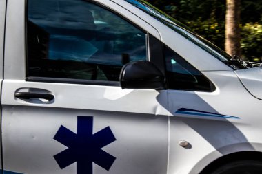 Paris, France - September 05, 2022 Ambulance driving through the streets of Paris during the coronavirus outbreak hitting France