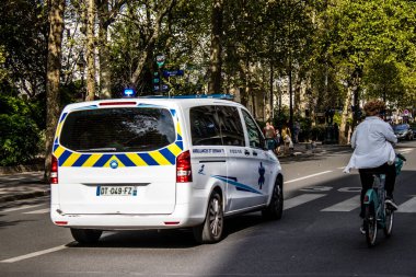 Paris, France - September 05, 2022 Ambulance driving through the streets of Paris during the coronavirus outbreak hitting France