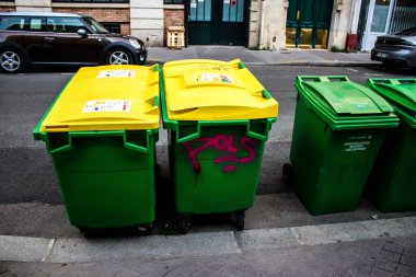 Paris, France - September 05, 2022 Garbage container in the downtown area of Paris, an emblematic city and the capital of France