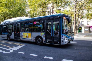 Paris, France - September 05, 2022 Bus driving through the streets of Paris, Buses are inexpensive and drop you off at any location in the capital quite quickly, many of its buses run on gas