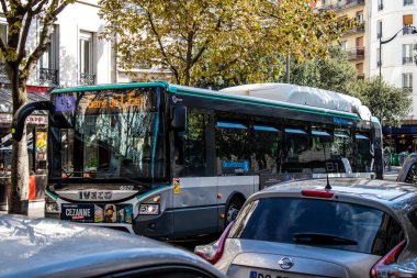 Paris, France - September 05, 2022 Bus driving through the streets of Paris, Buses are inexpensive and drop you off at any location in the capital quite quickly, many of its buses run on gas