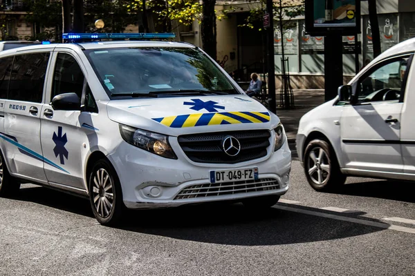 Paris, France - September 05, 2022 Ambulance driving through the streets of Paris during the coronavirus outbreak hitting France